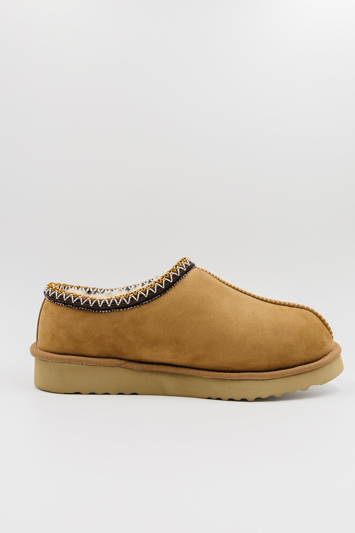 A single men's synthetic suede clog with a decorative black, white, and gold zigzag trim around the collar, shown from a side profile on a light gray background